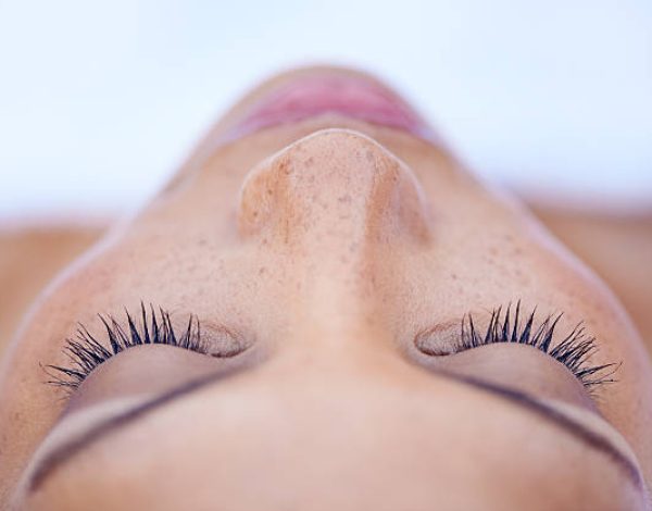 Cropped shot of an attractive young woman lying on her back